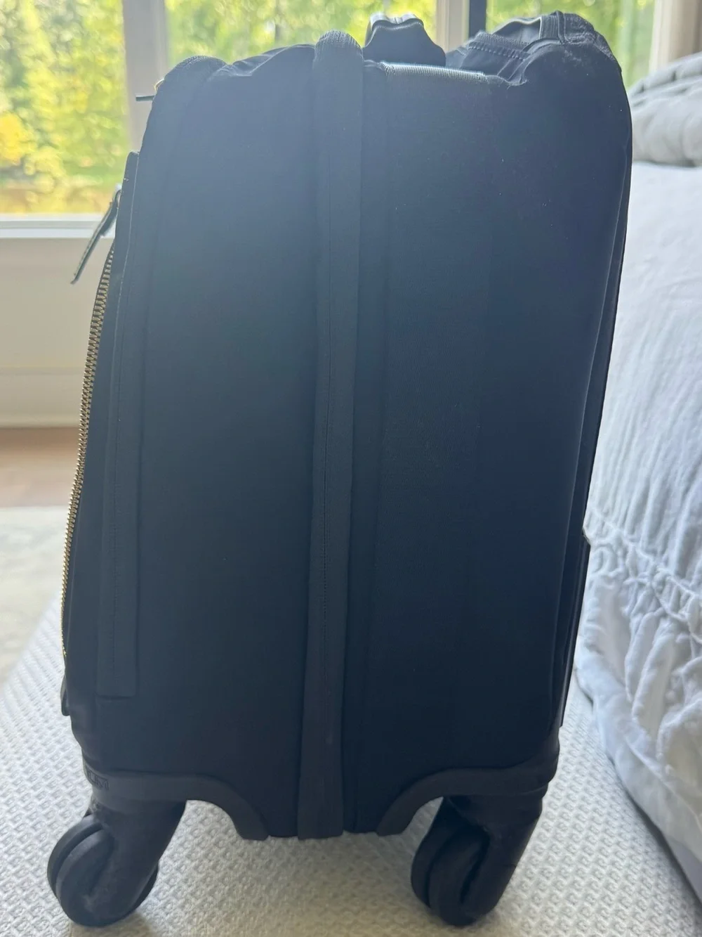 Tumi Black Travel Carry-On with Gold Hardware